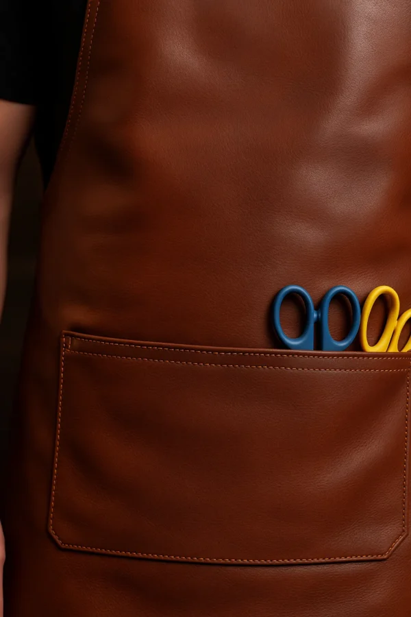 zoomed in view of brown leather apron